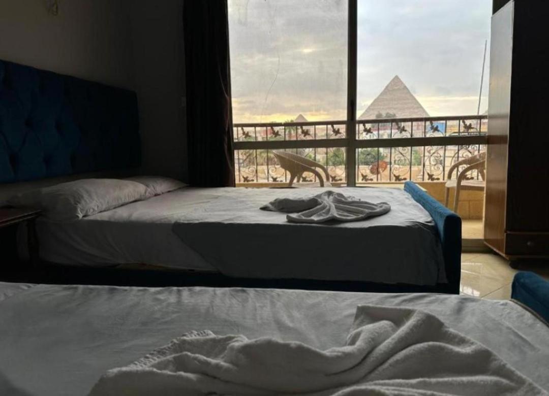 Pyramids Family Inn Kafrat al Jabal Exterior photo